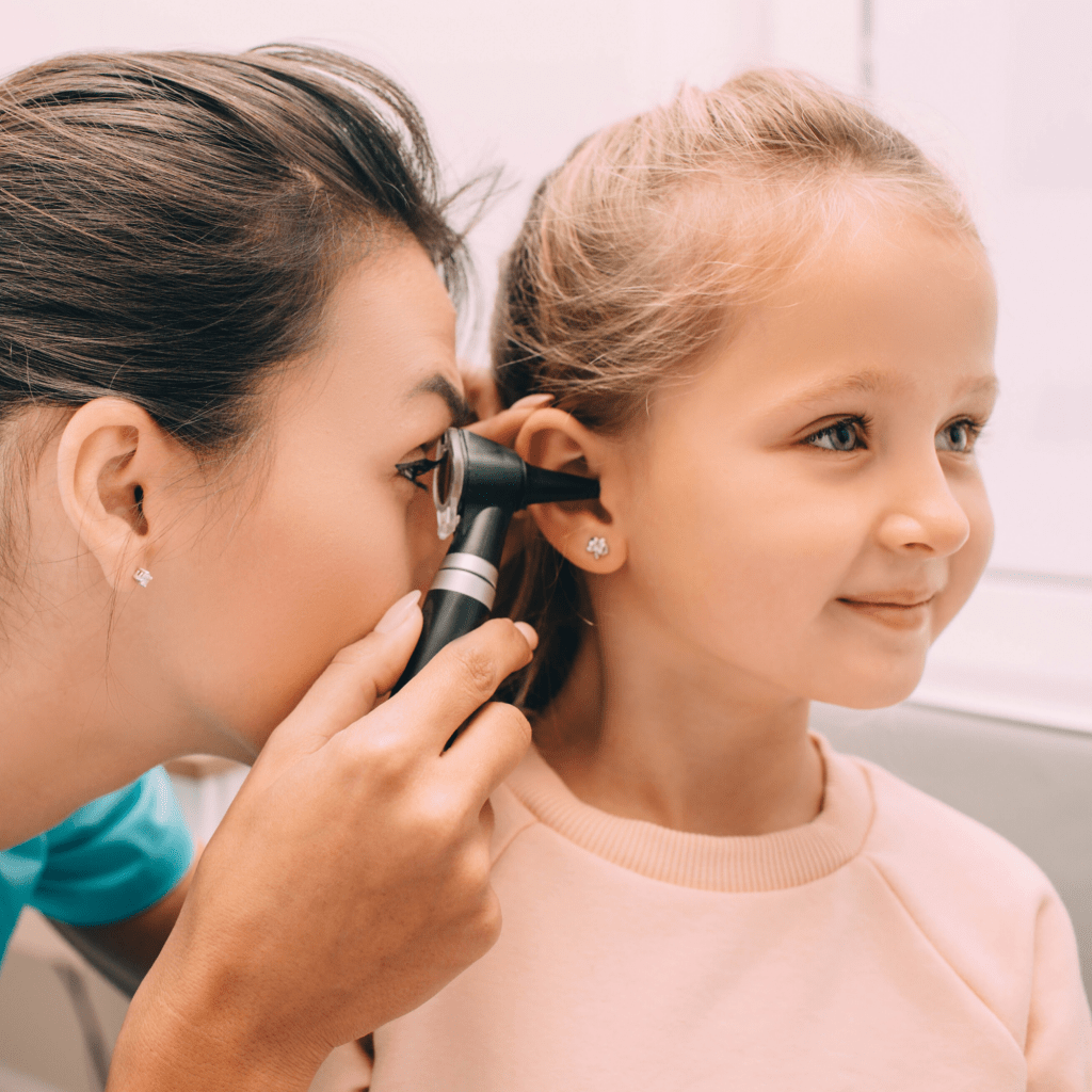 ENT checking out child ear